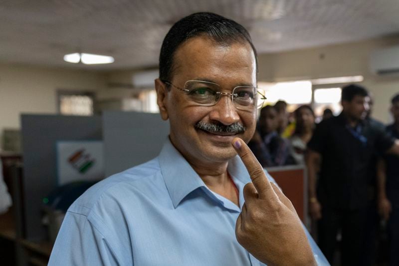 Aam Aadmi Party leader and Chief Minister of Delhi, Arvind Kejriwal shows his index finger marked with an indelible ink at a polling booth after casting his vote in the sixth round of polling in India's national election in New Delhi, India, Saturday, May 25, 2024. (AP Photo/Altaf Qadri)