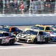 Christopher Bell (20), Kyle Busch (8), William Byron (24), Tyler Reddick (45), Joey Logano (22) and Ryan Blaney (12) head down the front straightaway after a caution flag during a NASCAR Cup Series auto race at Kansas Speedway in Kansas City, Kan., Sunday, Sept. 29, 2024. (AP Photo/Colin E. Braley)