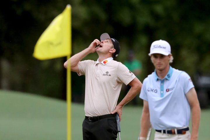 April 10, 2021, Augusta: Justin Rose reacts to a missed eagle putt on the eighth hole during the third round of the Masters at Augusta National Golf Club on Saturday, April 10, 2021, in Augusta. Also pictured is Will Zalatoris. Curtis Compton/ccompton@ajc.com