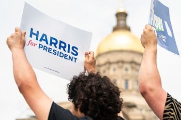 Members of Young Democrats of Georgia held signs in support of Vice President Kamala Harris during a news conference near the Georgia State Capitol in Atlanta on Wednesday.