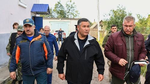 In this photo released by Press Service of the Government of the Tver Region of Russia on Wednesday, Sept. 18, 2024, Tver region governor Igor Rudenya, center, arrives to attend a meeting of the operational headquarters in Toropets, following the strike by Unmanned Aerial Vehicles in Toropets, Russia. (Press Service of the Government of the Tver Region of Russia via AP)