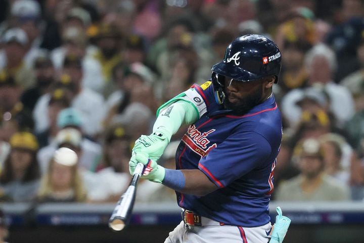 Atlanta Braves’ Michael Harris hits a 2-RBI home run against the San Diego Padres during the eighth inning of National League Division Series Wild Card Game Two at Petco Park in San Diego on Wednesday, Oct. 2, 2024.   (Jason Getz / Jason.Getz@ajc.com)