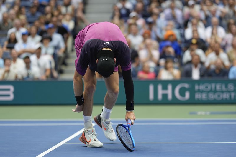 Jack Draper, of Great Britain, reacts after missing a shot from Jannik Sinner, of Italy, during the men's singles semifinal of the U.S. Open tennis championships, Friday, Sept. 6, 2024, in New York. (AP Photo/Julia Nikhinson)