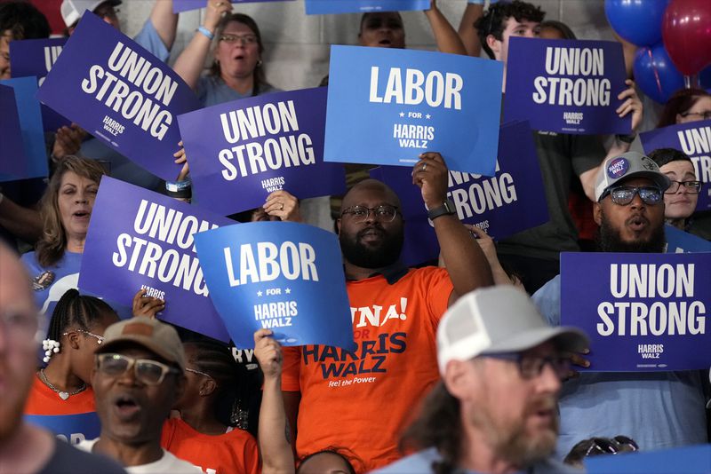 The executive board of Teamsters Joint Council 75 endorsed Vice President Kamala Harris for president on Tuesday. Pictured are her supporters at a Michigan rally.