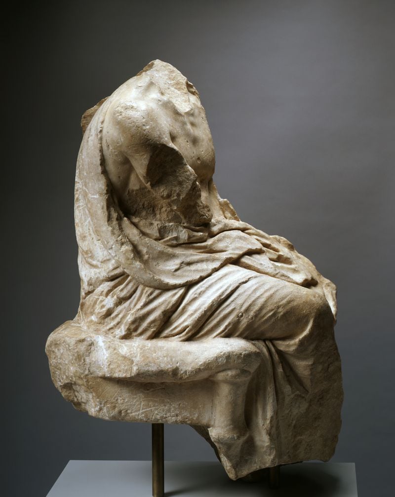 This marble seated figure, ca. 350-325 BCE., also was returned to Greece.