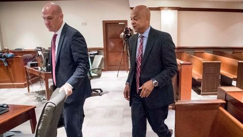 DeKalb County Sheriff Jeff Mann, right, with his attorney, Noah Pines, pleaded not guilty to charges of indecency and obstruction in Atlanta Municipal Court on Friday, June 2. JOHN AMIS / AJC