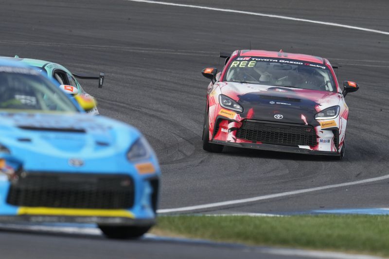 Keanu Reeves drives during the GR Cup Series auto race at Indianapolis Motor Speedway, Saturday, Oct. 5, 2024, in Indianapolis. (AP Photo/Darron Cummings)