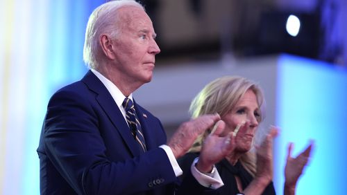 President Joe Biden, left, and first lady Jill Biden applaud before Biden delivers remarks on the 75th anniversary of NATO at the Andrew W. Mellon Auditorium, Tuesday, July 9, 2024, in Washington. (AP Photo/Evan Vucci)