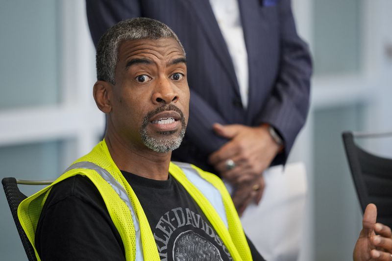 Anthony Wynn, a Longshoreman Union member, speaks during a press conference announcing a class action claim against the owners of the Dali, the cargo ship that crashed into the Francis Scott Key Bridge, seeking damages for economic losses suffered by union members due to halted commerce in and out of the Port of Baltimore, Thursday, Sept. 26, 2024, in Baltimore. (AP Photo/Stephanie Scarbrough)