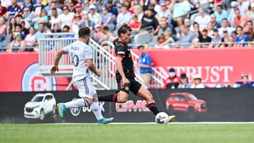 Atlanta United midfielder Santiago Sosa #5 dribbles the ball during the first half of the match against Chicago Fire FC at Soldier Field in Chicago, United States on Saturday July 30, 2022. (Photo by Dakota Williams/Atlanta United)