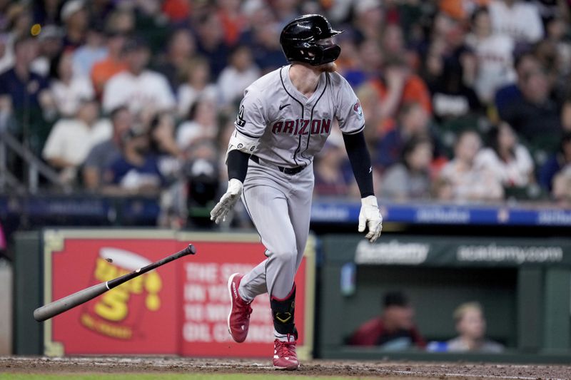 Arizona Diamondbacks' Pavin Smith watches his grand slam against the Houston Astros during the third inning of a baseball game Sunday, Sept. 8, 2024, in Houston. (AP Photo/Eric Christian Smith)