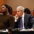 Atlanta rapper Young Thug sits next to his defense attorney Brian Steel during his ongoing gang and racketeering trial at Fulton County Courthouse on Thursday, April 4, 2024. 