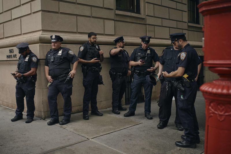 Police stand guard near Prime Minister of Israel, Benjamin Netanyahu's hotel during the 79th session of the United Nations General Assembly, in New York, on Friday, Sept. 27, 2024. (AP Photo/Andres Kudacki)