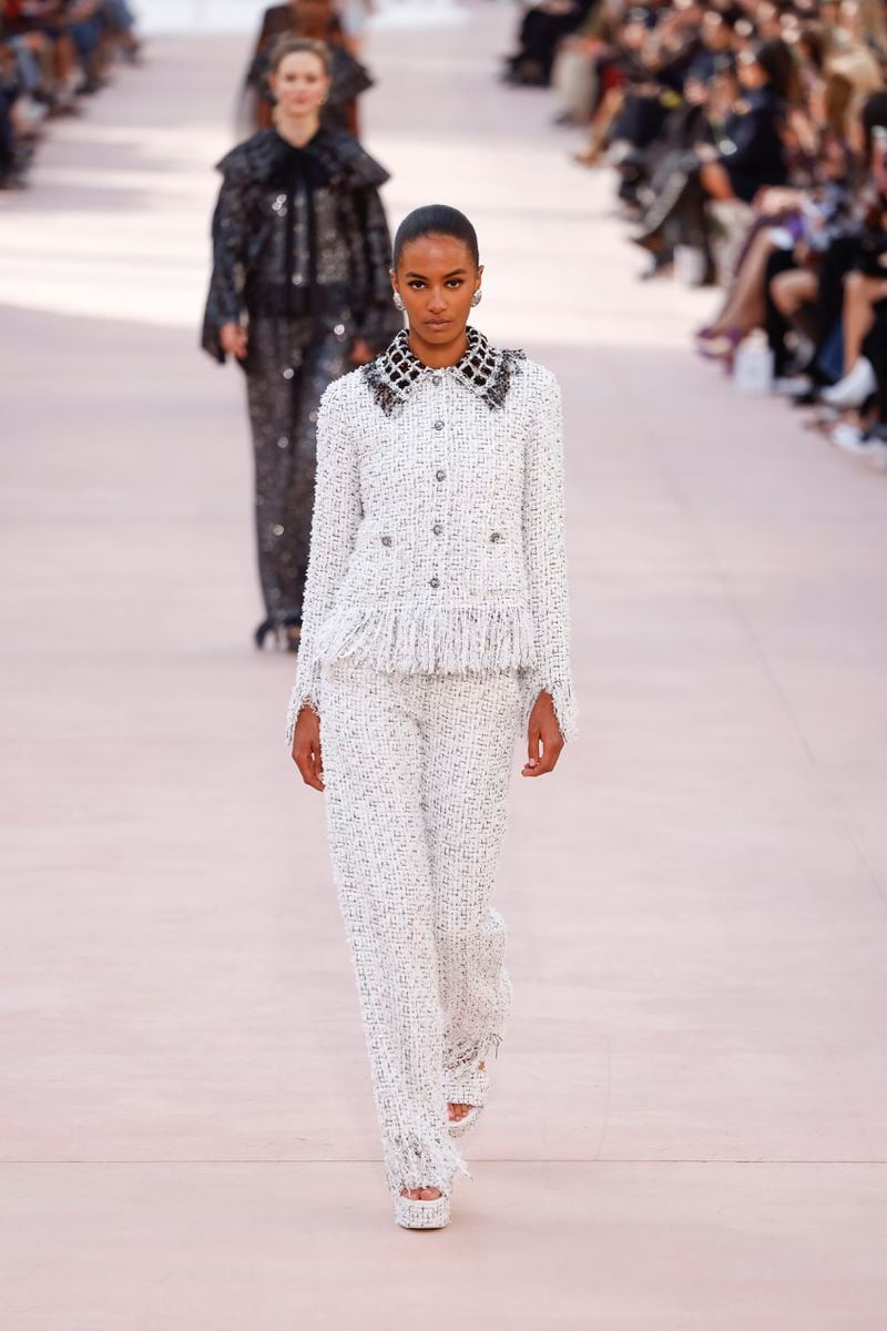 A model wears a creation as part of the Chanel Spring/Summer 2025 collection presented Tuesday, Oct. 1, 2024, in Paris. (Photo by Vianney Le Caer/Invision/AP)