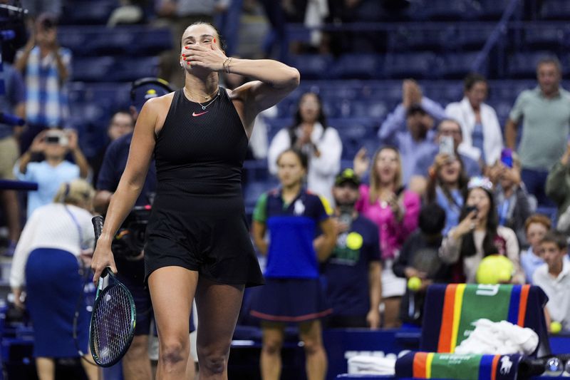 Aryna Sabalenka, of Belarus, reacts to winning a match against Erika Andreeva, of Russia, in the third round of the U.S. Open tennis championships Saturday, Aug. 31, 2024, in New York. (AP Photo/Julia Nikhinson)