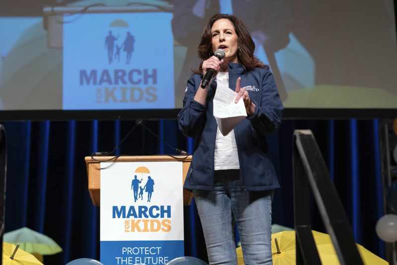 Moms for Liberty co-founder Tiffany Justice speaks at the Moms for Liberty National Summit in Washington, Saturday, Aug. 31, 2024. (AP Photo/Jose Luis Magana)