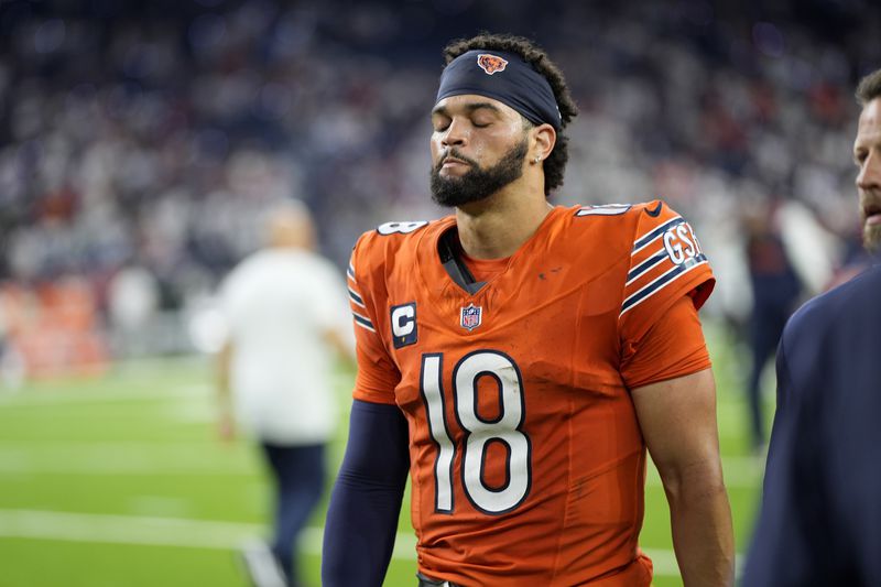 Chicago Bears quarterback Caleb Williams heads off the field following an NFL football game against the Houston Texans Sunday, Sept. 15, 2024, in Houston. The Texans won 19-13. (AP Photo/Eric Gay)