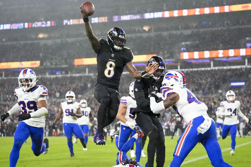 Baltimore Ravens quarterback Lamar Jackson (8) scores a touchdown against the Buffalo Bills during the second half of an NFL football game, Sunday, Sept. 29, 2024, in Baltimore. (AP Photo/Stephanie Scarbrough)