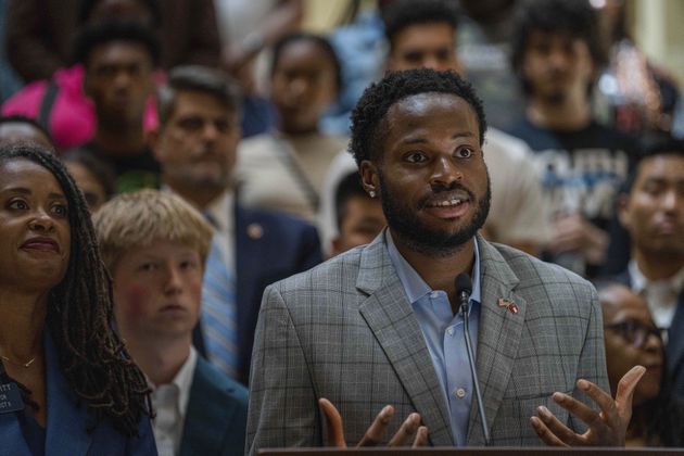 Bryce Berry, an Atlanta Public School Middle School math teacher and candidate for Georgia's 56th State House District, addresses the state school superintendent's decision to block state funding of an Advanced Placement African American Studies course at a joint Senate and House press conference on July 24 at the Georgia State Capitol in Atlanta. (Matthew Pearson/WABE via AP)