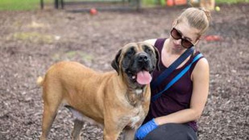 A DeKalb County volunteer appears with Janet about a year ago when Janet was at the shelter.