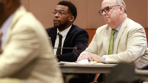 Deamonte Kendrick appears in court alongside defense attorney Doug Weinstein on Friday, July 21, 2023.  Weinstein is asking the Georgia Supreme Court to recuse the judge in the lengthy YSL trial. (Natrice Miller/ Natrice.miller@ajc.com)