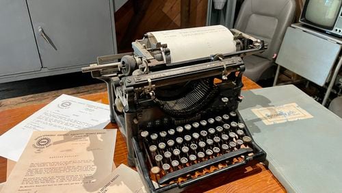 Documents, a typewriter and Mercury Sable seat from the Hapeville Depot Museum's “Civil Rights and Workers Rights: An Exhibition of Hapeville’s Atlanta Assembly Plant” exhibit.