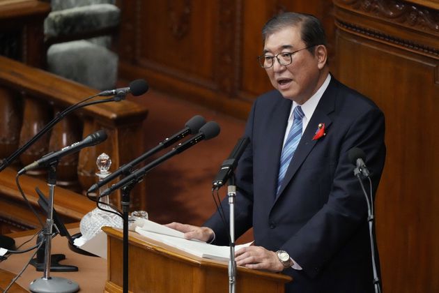 Japanese Prime Minister Shigeru Ishiba delivers his first policy speech during a Diet session at the Lower House of the Parliament Friday, Oct. 4, 2024, in Tokyo. (AP Photo/Eugene Hoshiko)