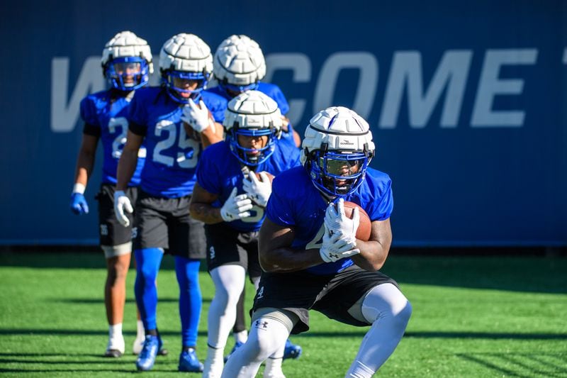 Georgia State football players practice at Center Parc Credit Union Stadium on Tuesday.