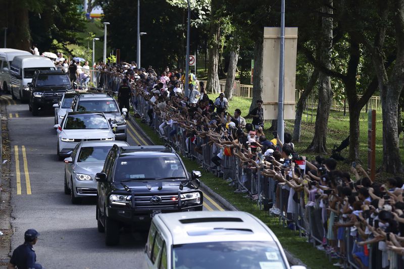 Pope Francis and entourage leave St Theresa's Home in Singapore, Friday, Sept. 13, 2024. (AP Photo/Suhaimi Abdullah)