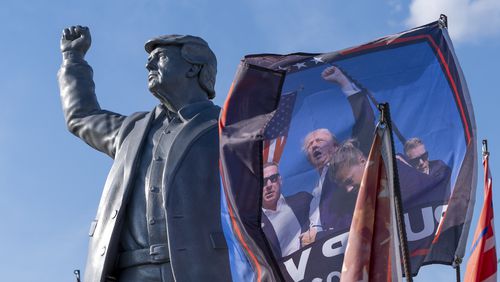 A statue of Republican presidential nominee former President Donald Trump is set up on a truck ahead of a campaign event at the Butler Farm Show, Friday, Oct. 4, 2024, in Butler, Pa. (AP Photo/Alex Brandon)