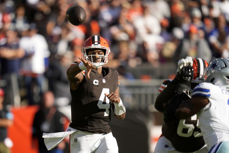 Cleveland Browns quarterback Deshaun Watson (4) throws a pass in the first half of an NFL football game against the Dallas Cowboys in Cleveland, Sunday, Sept. 8, 2024. (AP Photo/Sue Ogrocki)