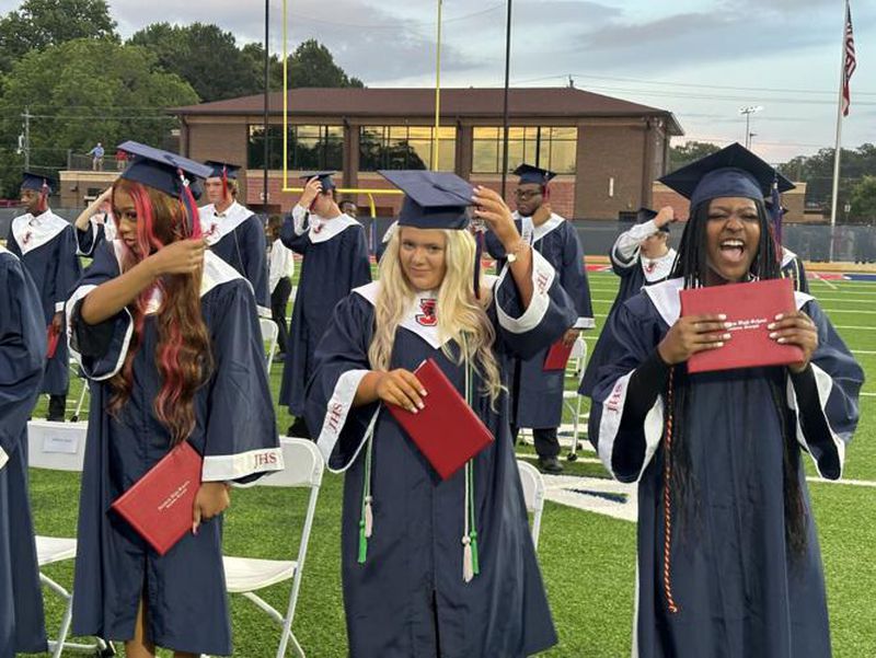 Joyia Lamar (far right) can't contain her happiness moments after the Jackson High School Class of 2024 turned their tassels, signifying they are officially JHS alumni. (Photo Courtesy of Sharon Dowdy Cruse)