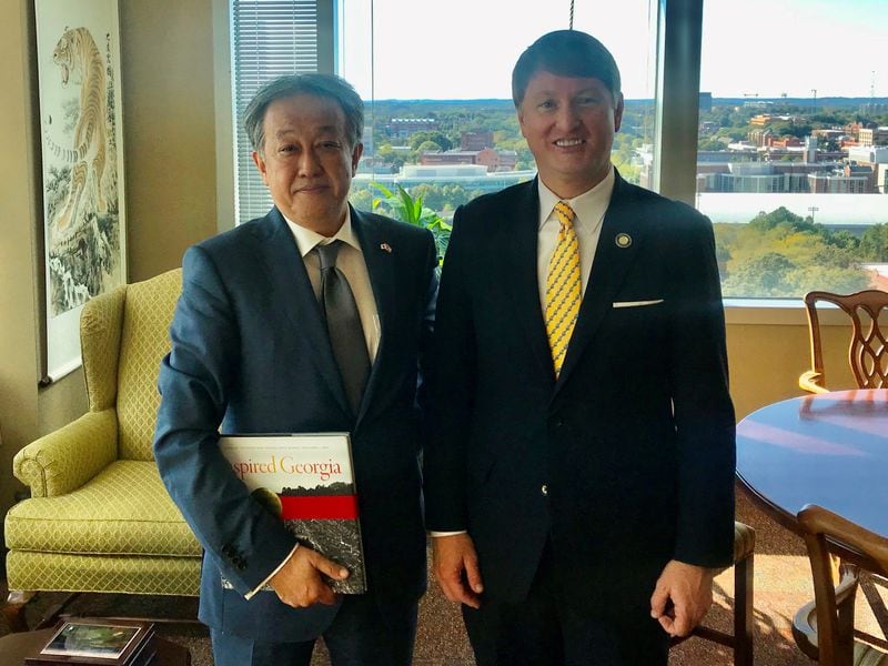 Georgia Department of Economic Development Director Pat Wilson (right) posed for a photo with Kazuyuki Takeuchi, the consul general of Japan in Atlanta, in 2019.