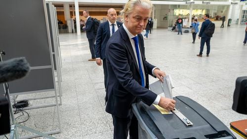 Anti-islam lawmaker Geert Wilders of the PVV, or Party for Freedom, casts his ballot for the European election in The Hague, Netherlands, Thursday, June 6, 2024. Voters in the European Union are set to elect lawmakers starting Thursday June 6th for the bloc's parliament. (AP Photo/Peter Dejong)