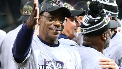 Braves third base coach Ron Washington chops from the stage while celebrating the World Series championship on Tuesday, Nov. 2, 2021, in Houston.   “Curtis Compton / Curtis.Compton@ajc.com”