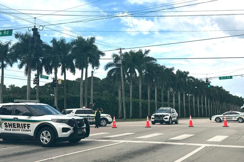 Sheriff vehicles are pictured near Trump International Golf Club, Sunday. Sept. 15, 2024, in West Palm Beach, Fla., after gunshots were reported in the vicinity of Republican presidential candidate former President Donald Trump. (AP Photo/Stephanie Matat)