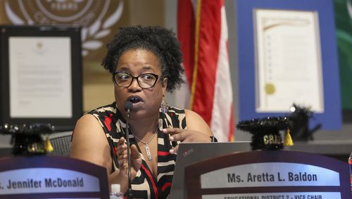 Aretta Baldon chairs the Atlanta school board's audit committee, which reviewed the special education audit in June. She told new Superintendent Bryan Johnson, " ... we’re about to pass this baton, and we’re going to need you to grab it and run like (U.S. Olympic track star) Sha’Carri (Richardson) and take us to gold.”  (Jason Getz / Jason.Getz@ajc.com)