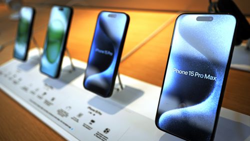 FILE - Apple iPhone 15 ProMax phones are shown in an Apple store in Pittsburgh, on June 3, 2024. Apple reports earnings on Thursday, Aug. 1, 2024. (AP Photo/Gene J. Puskar, File)
