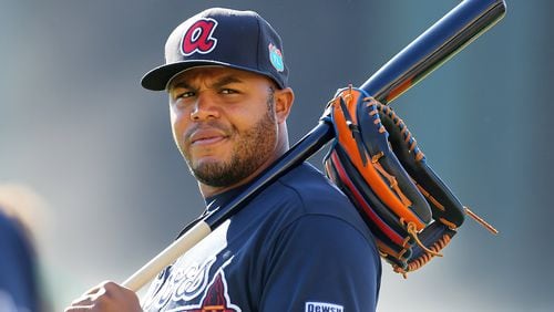 Andruw Jones, shown here before a weekend spring-training workout, has been hired as a Braves special assistant in baseball operations. He has been in camp as a guest instructor for nearly a week. (Curtis Compton / ccompton@ajc.com)