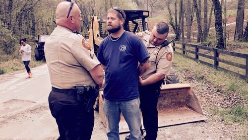 Shannon Hamilton, of Gainesville, was arrested Sunday on the Gene Nix Road bridge. In March, his 16-year-old daughter died when the car she was a passenger in plunged from the bridge and into a creek. (Photo: Kale Hamilton/Special)