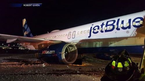 Plane from Georgia skids off icy taxiway in Boston