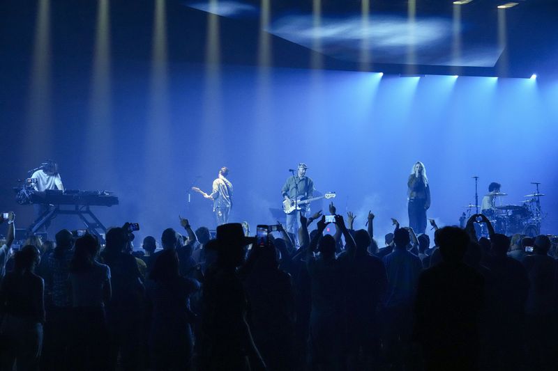 Joe Hahn, from left, Alex Feder (filling in for guitarist Brad Delson), Phoenix, Mike Shinoda, Emily Armstrong, and Colin Brittain of Linkin Park performs Thursday, Sept. 5, 2024, in Los Angeles. It was announced on Thursday that Dead Sara's Emily Armstrong would join as the band's new co-singer and songwriter/producer Colin Brittain would join on drums. Linkin Park will release the album "From Zero" on Nov. 15, marking their first new record since former frontman Chester Bennington died in 2017. (Photo by Jordan Strauss/Invision/AP