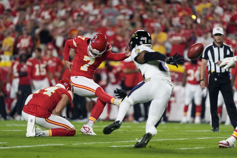 Kansas City Chiefs kicker Harrison Butker (7) makes a 32-yard field goal during the first half of an NFL football game against the Baltimore Ravens Thursday, Sept. 5, 2024, in Kansas City, Mo. (AP Photo/Charlie Riedel)