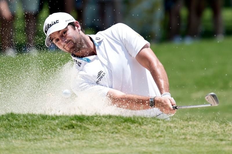 Davis Riley hits from the sand on the second hole during the final round of the Charles Schwab Challenge golf tournament at Colonial Country Club in Fort Worth, Texas, Sunday, May 26, 2024. (AP Photo/LM Otero
