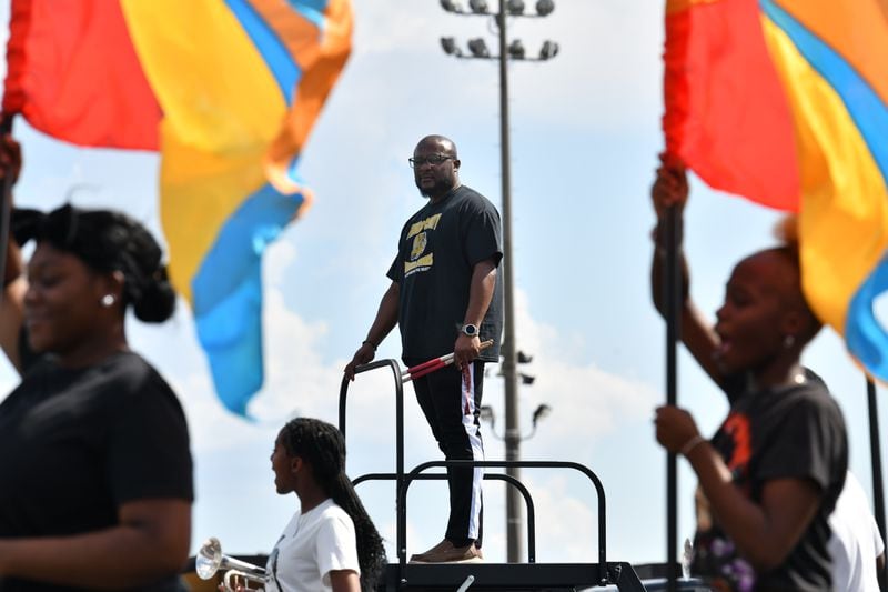 Twiggs County High School band director Ernest Stackhouse overlooks a recent practice session. (Hyosub Shin / AJC)