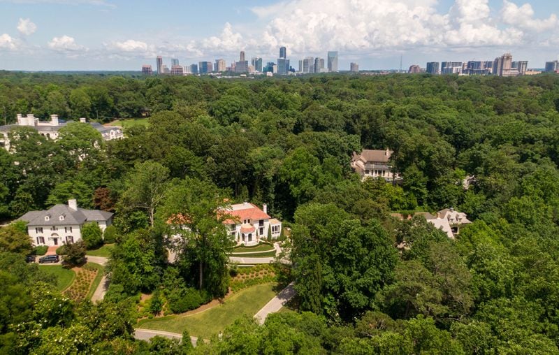 Buckhead is known for its spacious, wooded neighborhoods and upscale shopping options. (Hyosub Shin / Hyosub.Shin@ajc.com)