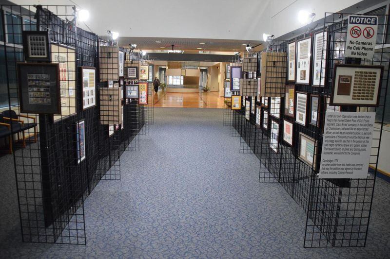 Mike Glenn's Black History stamp collection is part of Gwinnett County's Black History Month exhibit at the Gwinnett Justice and Administration Center. (Courtesy of Curt Yeomans)