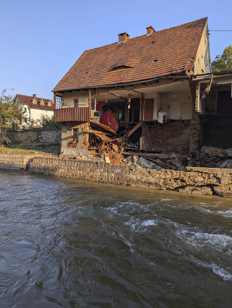 This handout photo provided by the State Fire Service of Poland, shows damages after the flooding in southwestern Poland, Ladek Zdroj, Poland, on Thursday, Sept. 19 , 2024. (Grzegorz Rozanski/KG PSP via AP)