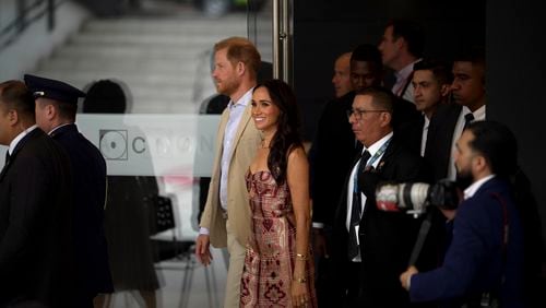 Prince Harry and Meghan arrive at the Delia Zapata National Arts Center for a welcoming ceremony, in Bogota, Colombia, Thursday, Aug. 15, 2024. (AP Photo/Ivan Valencia)