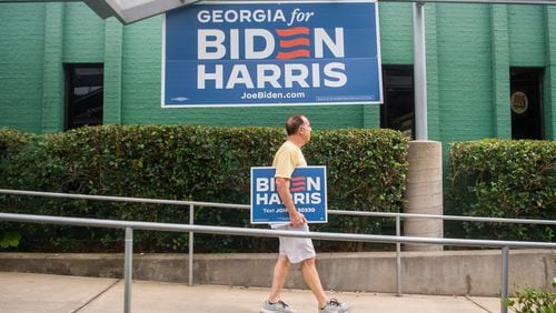 Campaign offices across the Atlanta area Tuesday still featured the big, navy blue “Georgia for Biden-Harris” signs outside their buildings. But the 21 campaign headquarters throughout the state will update their windows in the coming days with new signage as Harris’ presidential run gets off the ground.  (Ziyu Julian Zhu / AJC)